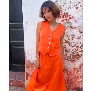 Chaleco botones y falda naranja seda